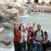 Tossing those coins in the Trevi Fountain in Rome.